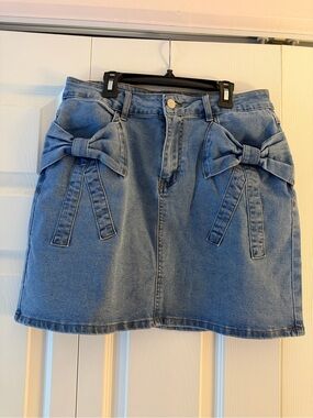 Blue Denim A-Line Mini Skirt with Bow Accents